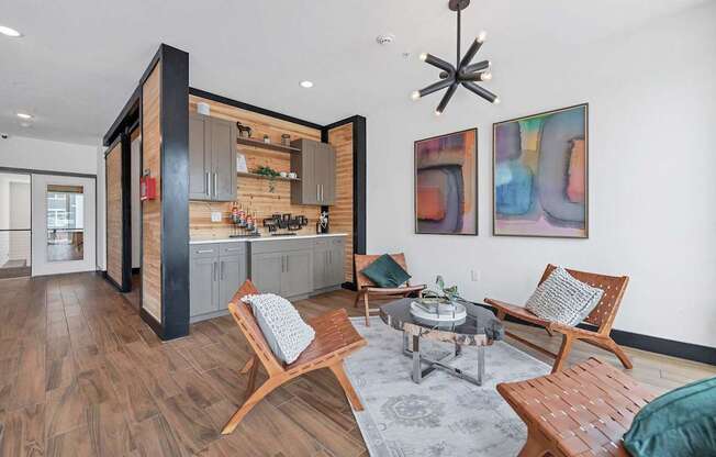 A modern living room with wooden floors and furniture.