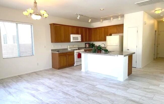 Gated Community! Fabulous 4 Bedrooms Plus Large Loft. One Bed and Bath Downstairs.