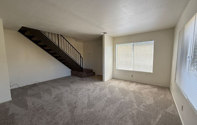 Large Two Story Condo with Two Car Detached Garage and Water/Trash Included