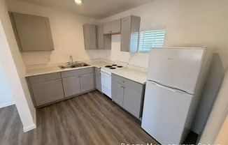 1707 E APACHE BLVD