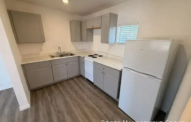 1707 E APACHE BLVD