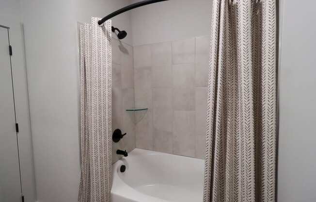 The Crest at South Point 1 Bed Model Apartment Bathroom Soaking Tub located in McDonough, GA