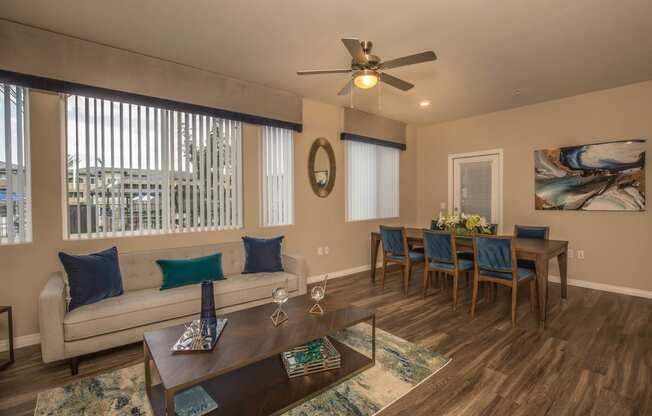 Living room with window at Level 25 at Oquendo by Picerne, Las Vegas, NV