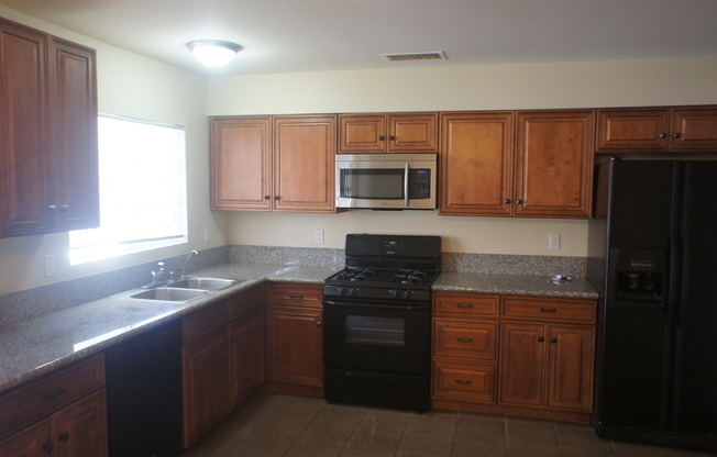 Charming 3Bed/2Bath/2Car residence with gated pool located in E. Las Vegas- Weekly Pool Service included!!