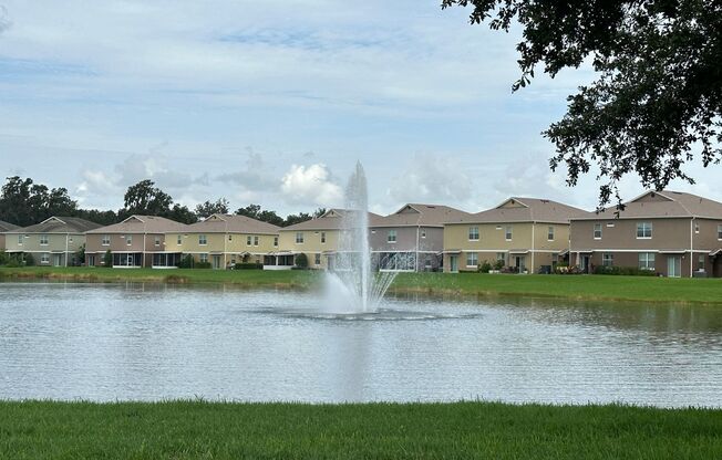 Charming 2-Bedroom Townhome in Highly Desirable Winter Garden | Gated Community with Abundant Amenities | Fully Tiled, Newer Appliances & Inside Laundry | One-Car Garage Included