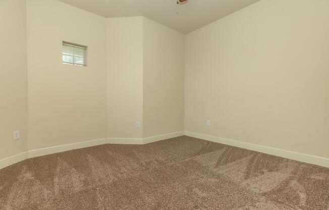 a bedroom with a large mirror