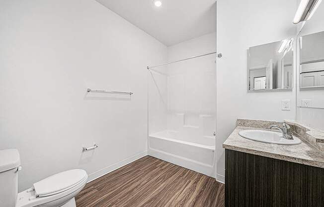 main bathroom with hard surface flooring at Trade Winds Apartment Homes, Elkhorn, NE