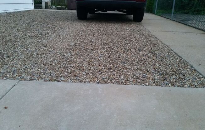 Modern 2 Bed/1 Bath row house with off-street parking!