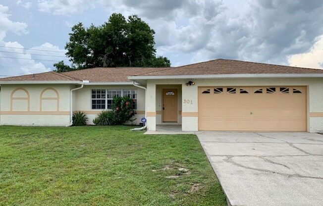 Lovely 3/2 in Poinciana! HUGE fenced yard and NO CARPET!