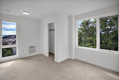 INDUSTRIAL-STYLE QUEEN ANNE TOWNHOUSE WITH VIEWS OF THE WATER FROM EVERY FLOOR!