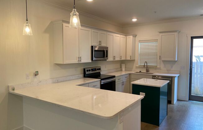 Beautiful Gated Community in Heart of Midtown. 2-Story Unit Features 2bds/2.5bths with 2 Gated Parking Spaces! Pets are allowed with fees.