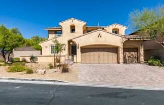 Gated Summerlin West Home with 5 Bedrooms, Den, Loft & Primary Suite Downstairs