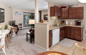 a view of a kitchen and living room with a dining room table