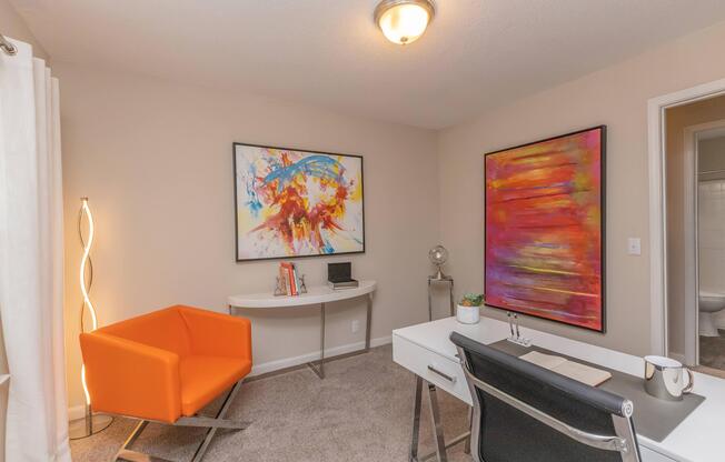 a living room filled with furniture and a flat screen tv