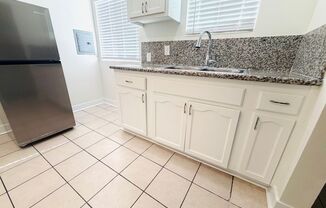 1233 -1235 Spruce St. (11 units)