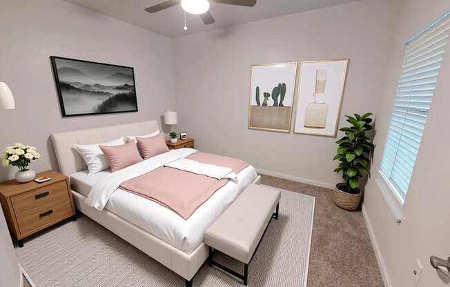 A bedroom with a bed, nightstand, and a plant.