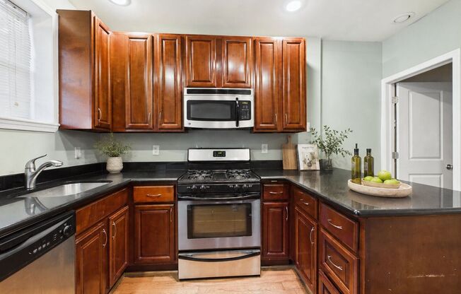 Lower Moyamensing Townhome with Private Patio, Finished Basement & Modern Updates