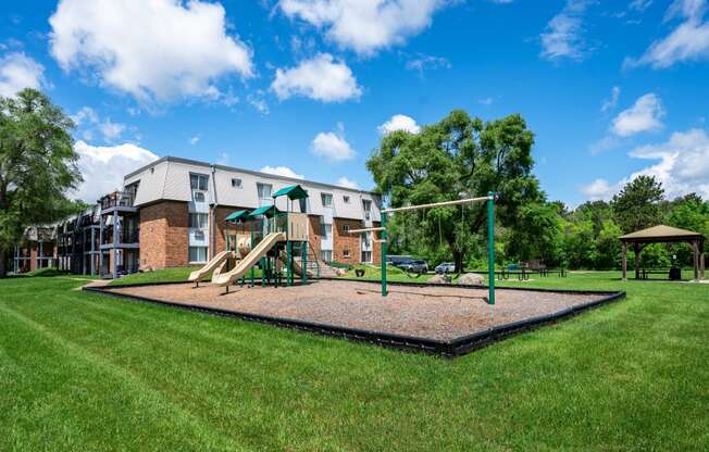 our apartments have a playground for your kids to play. Coon Rapids, MN Robinwood Apartments