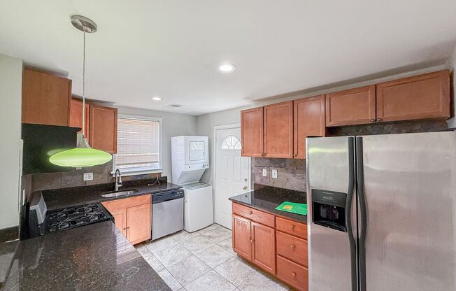STUNNINGLY RENOVATED 5BR/2BA END UNIT ROW HOME.   WASHER/DRYER INCLUDED