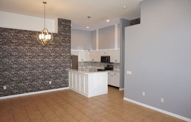 Designer 3/2 with 2 Car Garage in Desirable Location