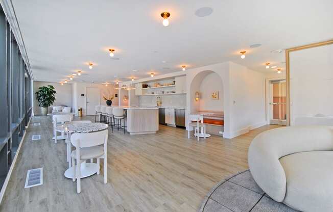 a living room with a dining room and a kitchen