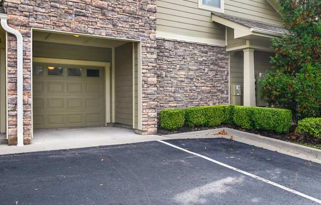 a garage door on the side of a building at Sovereign at Overland Park, Kansas, 66213