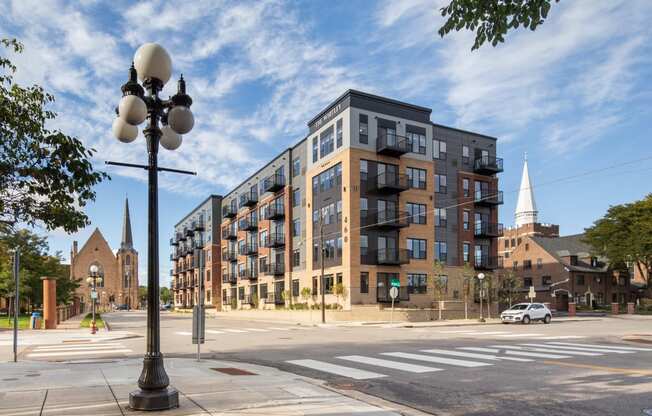 Full exterior street view of  The Whitley apartment building.