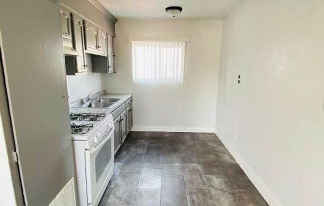 225 E CENTURY BLVD