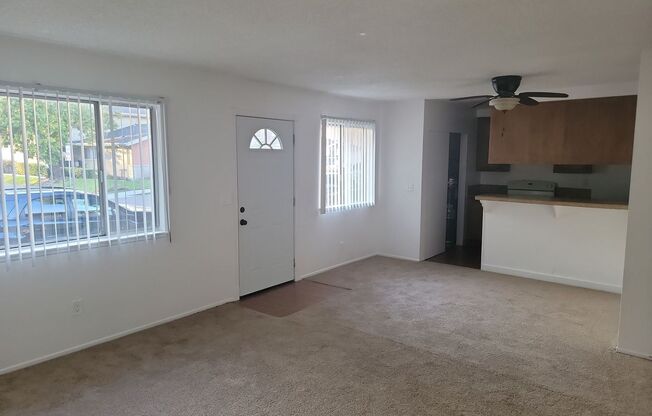 Very Nicely Upgraded Single Story Condo with New carpeting and wood plank flooring.