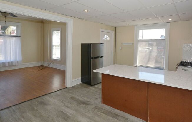 Spacious 1bed/1bath on main floor of with tons of windows! - Ask about our no security deposit option!