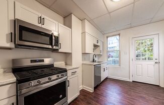 AVAILABLE August 2024 - Updated 4+ Bedroom Townhouse  Located on the Bus Line!