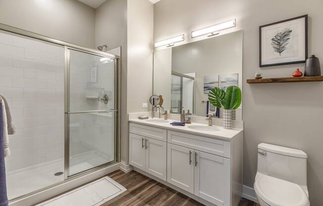 The Airdrie at Paoli Station double sink vanity and glass enclosed shower