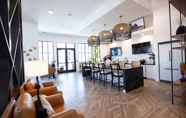 a living room with a kitchen and a dining room