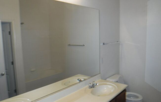 SECOND STORY CONDO IN GATED COMMUNITY WITH ACCESS TO POOL/SPA