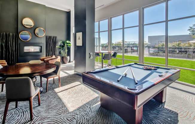 resident lounge with billiards pool table