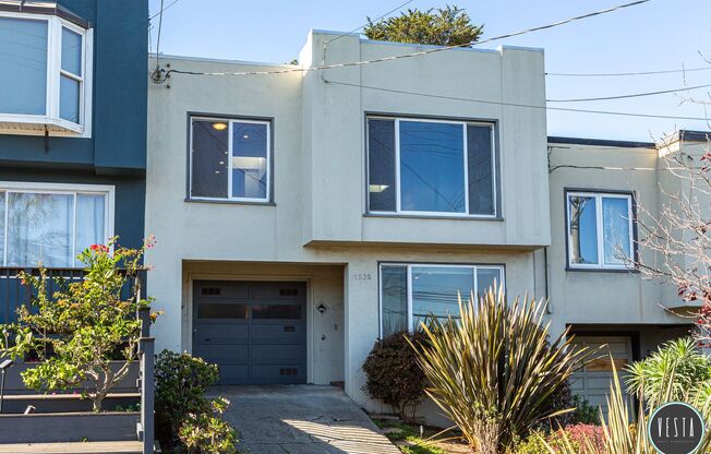 ELEGANT 3BD/2BA NOE VALLEY HOME WITH PRIVATE YARD AND STUNNING VIEWS