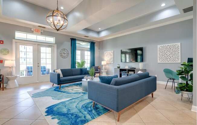 clubhouse shot with blue couches and rug