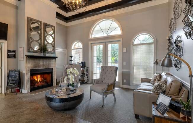 a living room with a fireplace and a couch