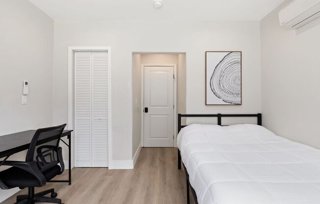A 6 Bedroom, 6 Bathroom apartment with common areas and a fully functional kitchen at 1709 Kelton Ave.