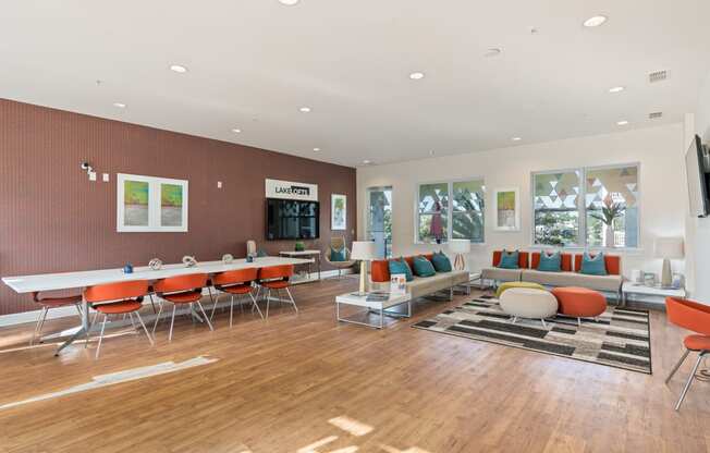 a living room with tables and chairs and a couch