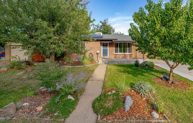 Spacious 4-Bedroom Home with Updated Kitchen, Finished Lower Level & Huge Backyard