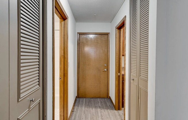 Step into comfort at Central Lakes of Uptown, where modern design meets inviting spaces. Explore thoughtfully designed hallways leading to your dream home. Don't miss out on your ideal living experience—schedule a tour today!