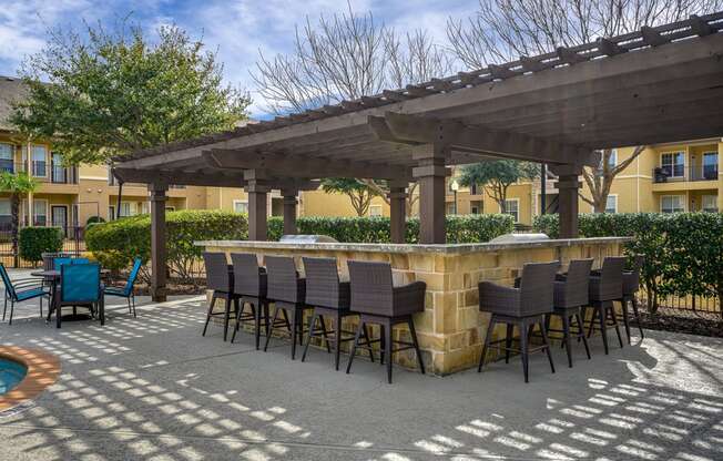 Outdoor Grill With Intimate Seating Area at Riachi at One21, Texas, 75025