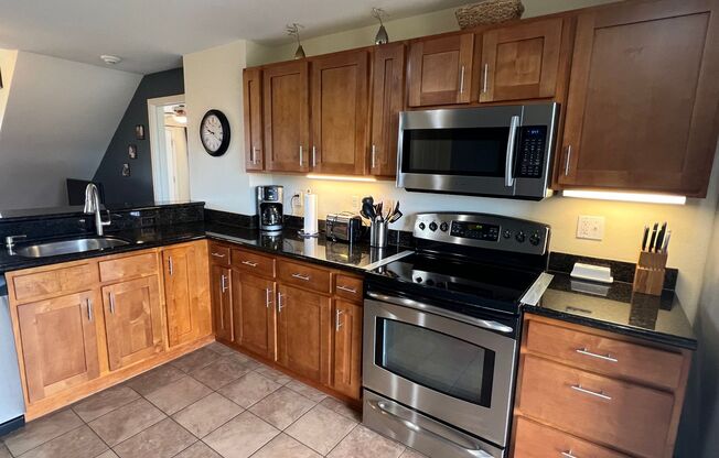Top-Floor Ocean View Condo Across from the Beach | Furnished 2BR + Central A/C