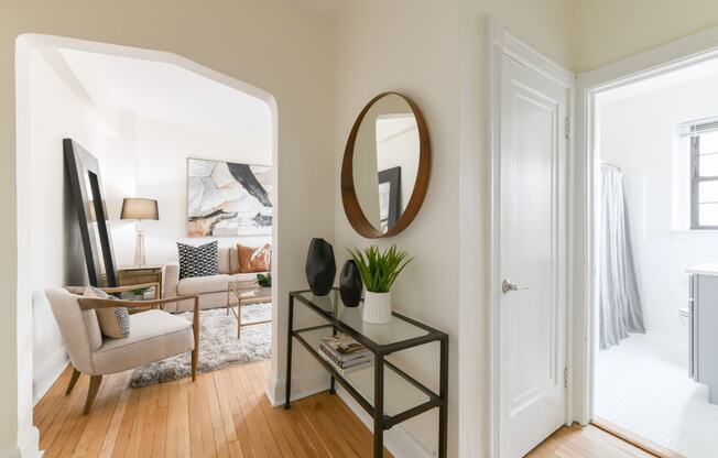 hallway view of living area and bathroom at the dahlia apartments in washington dc