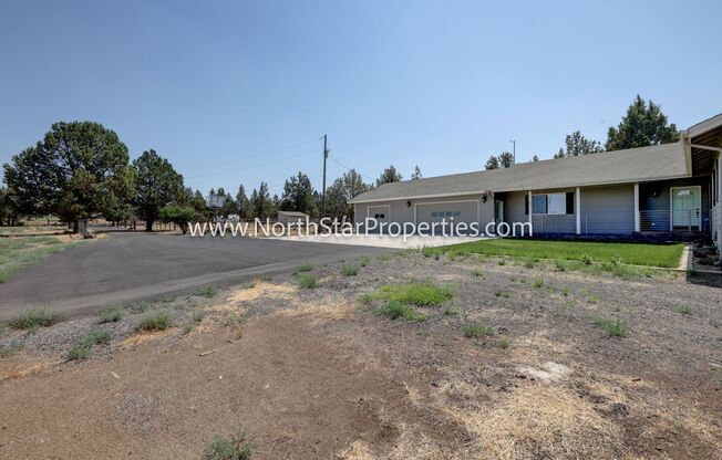 Beautiful Bend property with paddocks and land.