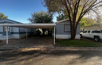 3/2 Mobile Home with a Double Carport in Commanders Palace - HALF OFF FIRST MONTHS RENT!