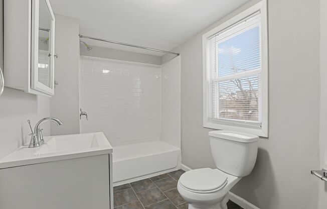 Spacious 4-Bedroom, 1-Bathroom home with Modern Amenities in Downtown Baltimore