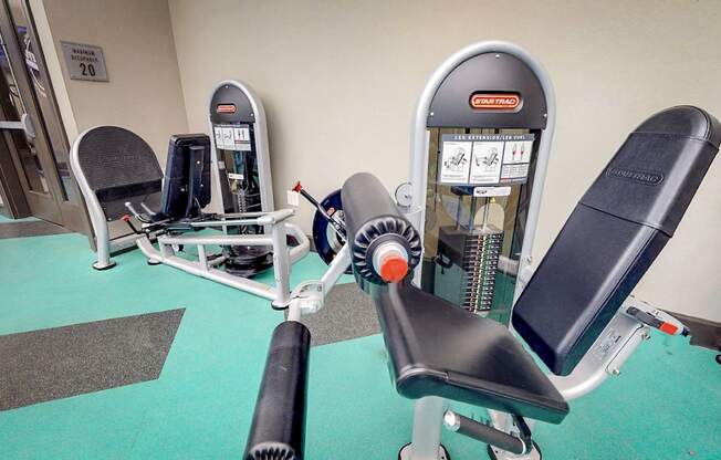 Row of exercise machines in fitness center at Civic at Frisco Square Apartments, Frisco, TX, 75034