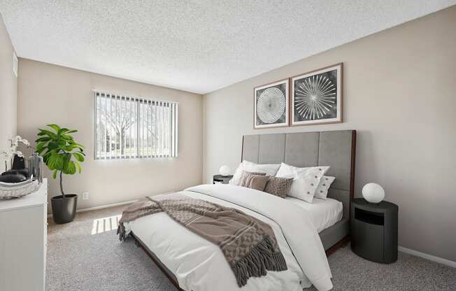 a bedroom with a bed and a window